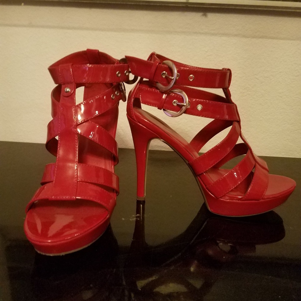 Beautiful 7 1/2 red platform high heel shoes.